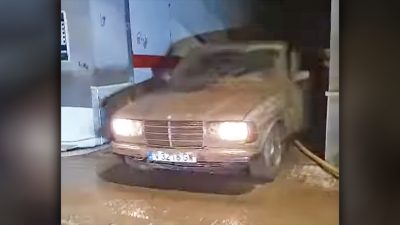 flooded mercedes drives out